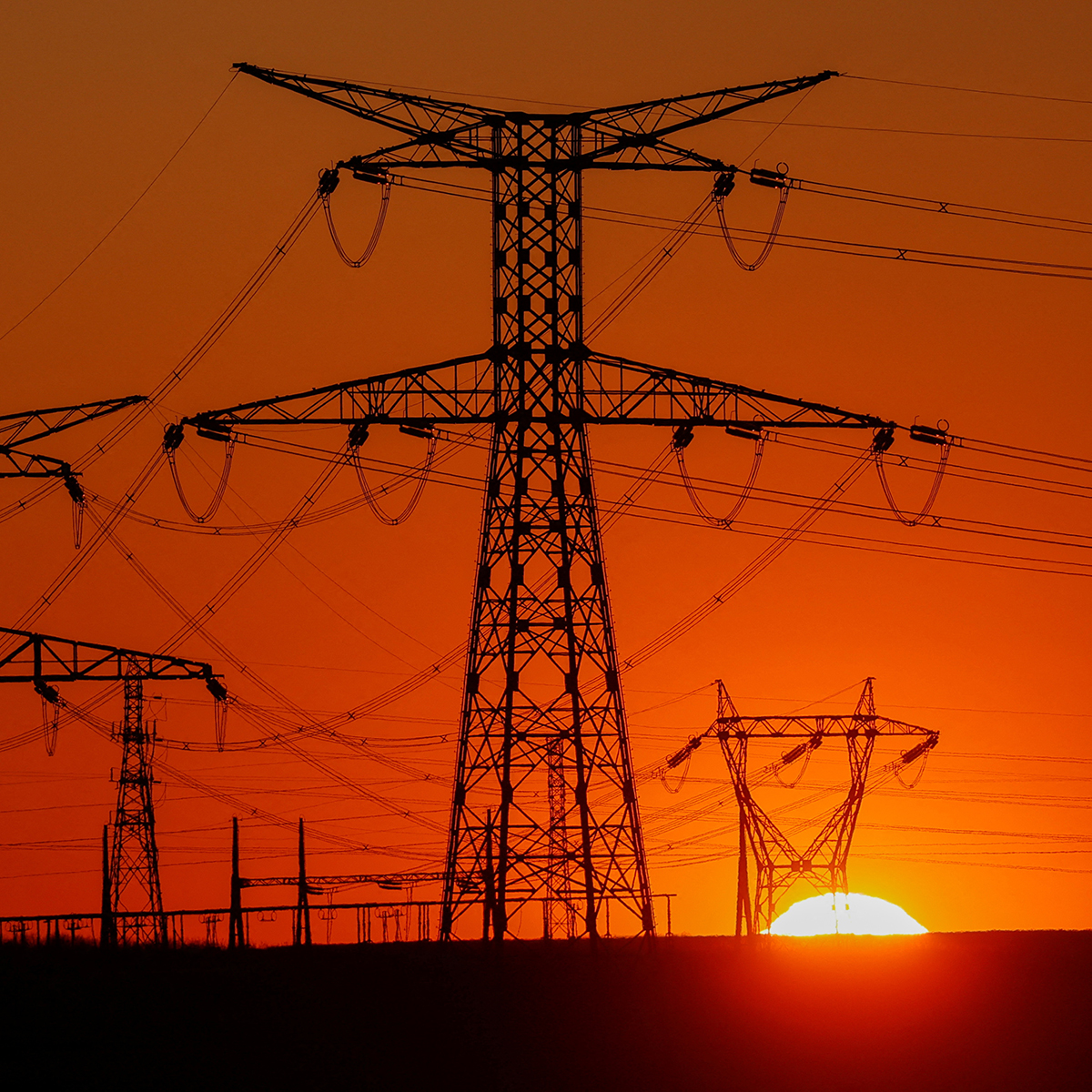High voltage wires in the sunset