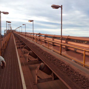 Conveyor carrying iron ore